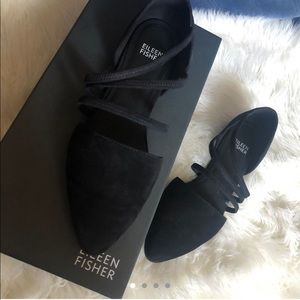 Black suede pointed toe flats